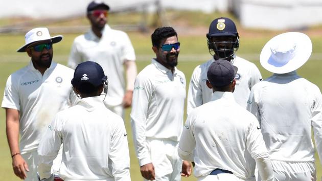 Ravindra Jadeja (C) celebrates with his teammates after dismissing Sri Lanka Board President's XI cricketer Dhananjaya de Silva. (AFP) Ravindra Jadeja (C) celebrates with his teammates after dismissing Sri Lanka Board President's XI cricketer Dhananjaya de Silva. (AFP)