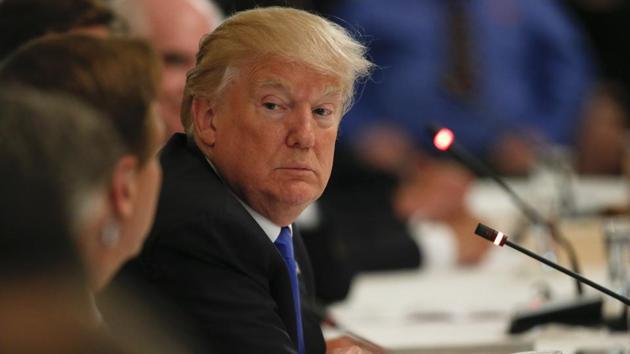 US President Donald Trump listens during a "Made in America," roundtable event in the East Room of the White House, July 19, 2017, in Washington.(AP File Photo)