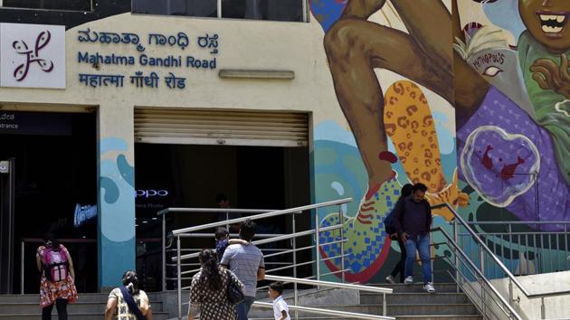 Signage at Mahatma Gandhi Metro station written in Hindi language along with English and Kannada in Bengaluru, on June 23, 2017. People in Bengaluru have been protesting against the use of Hindi language at metro stations.(Arijit Sen/HT File Photo)
