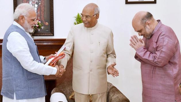 Prime Minister Narendra Modi with president-elect Ram Nath Kovind and BJP president Amit Shah, New Delhi, June 20 (PTI) Prime Minister Narendra Modi with president-elect Ram Nath Kovind and BJP president Amit Shah, New Delhi, June 20 (PTI)
