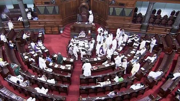 Members creating noise during the monsoon session of the Rajya Sabha in New Delhi on Friday.(PTI)