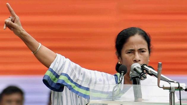 Trinamool Congress chief Mamata Banerjee addresses a rally in Kolkata on Friday. (PTI) Trinamool Congress chief Mamata Banerjee addresses a rally in Kolkata on Friday. (PTI)