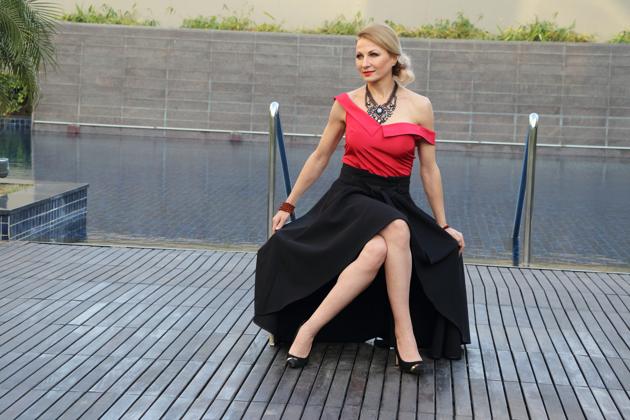 Fitness expert Vesna Jacob has done a lot of print ads and has also walked the ramp for leading names. She is wearing a red off-shouldered top teamed with a black skirt, Evoking vintage vibes, she has accessorised her look with a statement neckpiece and red lips. (HT photo/ Shara Ashraf ) Fitness expert Vesna Jacob has done a lot of print ads and has also walked the ramp for leading names. She is wearing a red off-shouldered top teamed with a black skirt, Evoking vintage vibes, she has accessorised her look with a statement neckpiece and red lips. (HT photo/ Shara Ashraf )