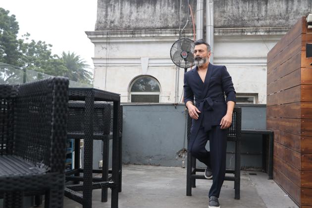 Ex-army man Nitin Mehta has walked for popular designers on the runway. Here, he is wearing a navy blue kimono suit by designer Pawan Sachdeva. His salt and pepper beard goes very well with his look. ( Styling: Akshay Kaushal) (HT Photo/ Shara Ashraf) Ex-army man Nitin Mehta has walked for popular designers on the runway. Here, he is wearing a navy blue kimono suit by designer Pawan Sachdeva. His salt and pepper beard goes very well with his look. ( Styling: Akshay Kaushal) (HT Photo/ Shara Ashraf)
