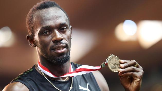 Usain Bolt poses with his gold medal after winning the men's 100m event at the IAAF Diamond League athletics meeting in Monaco. (AFP) Usain Bolt poses with his gold medal after winning the men's 100m event at the IAAF Diamond League athletics meeting in Monaco. (AFP)