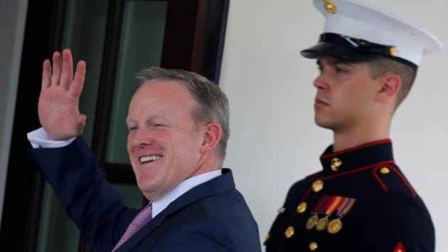 Outgoing White House Press Secretary Sean Spicer waves as he walks into the White House in Washington, US, July 21, 2017. (Reuters) Outgoing White House Press Secretary Sean Spicer waves as he walks into the White House in Washington, US, July 21, 2017. (Reuters)