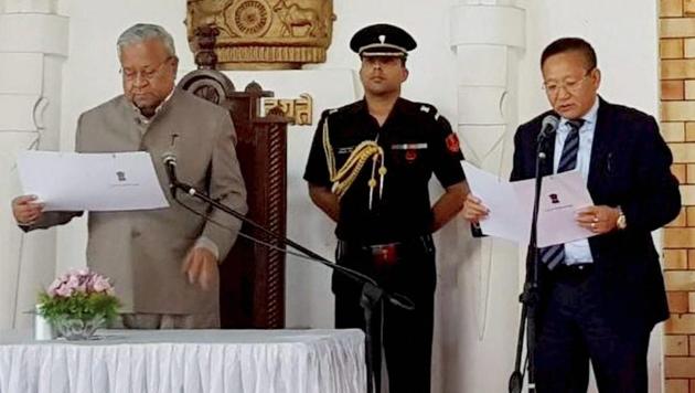 TR Zeliang being sworn-in as the new chief minister of Nagaland by Governor PB Acharya at a ceremony in Kohima on July 19, 2017. (PTI Photo) TR Zeliang being sworn-in as the new chief minister of Nagaland by Governor PB Acharya at a ceremony in Kohima on July 19, 2017. (PTI Photo)
