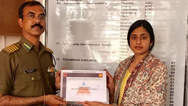 42 BRTF commander RS Rao handing over request for land acquisition for tunnels to West Kameng deputy commissioner Sonal Swaroop. (HT Photo) 42 BRTF commander RS Rao handing over request for land acquisition for tunnels to West Kameng deputy commissioner Sonal Swaroop. (HT Photo)