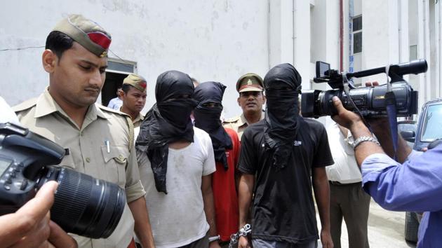 The accused held in the Jewar gang-rape and robbery case in police custody. (Sunil Ghosh/HT Photo) The accused held in the Jewar gang-rape and robbery case in police custody. (Sunil Ghosh/HT Photo)