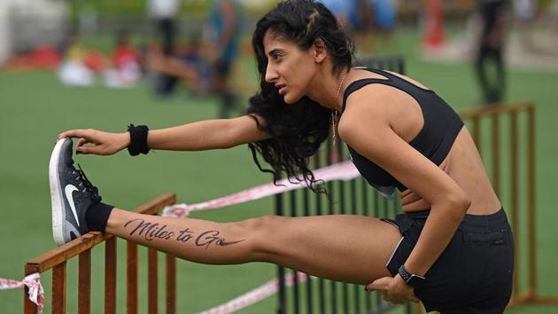Good to stretch before the run. (Satyabrata Tripathy/HT Photo) 