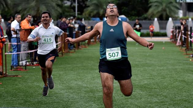Karan Thakur, the winner of the 5km run. (Satish Bate/HT Photo) 