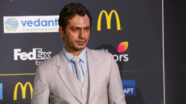 Nawazuddin Siddiqui poses for a picture on the Green Carpet at the International Indian Film Academy Awards.(REUTERS)