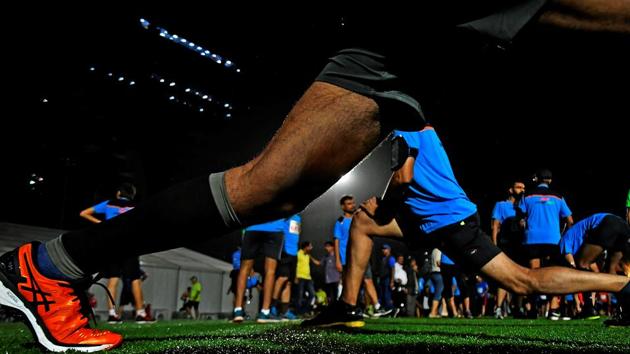 Participants do their warm-up. (Shashi S Kashyap/HT PHOTO) 