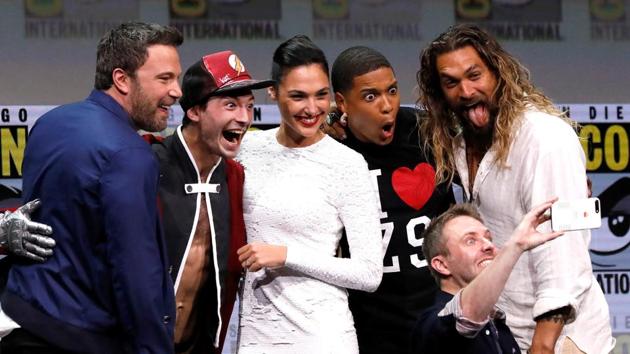 Ben Affleck, Ezra Miller, Gal Gadot, Ray Fisher and Jason Momoa pose with moderator Chris Hardwick at Comic-Con. (REUTERS) Ben Affleck, Ezra Miller, Gal Gadot, Ray Fisher and Jason Momoa pose with moderator Chris Hardwick at Comic-Con. (REUTERS)