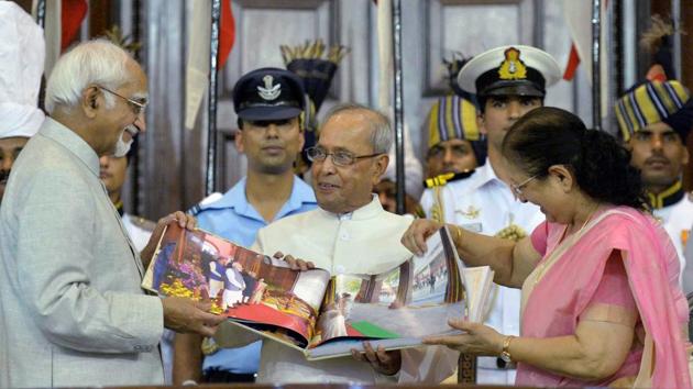 President Pranab Mukherjee is presented a coffee-table book by vice president Hamid Ansari and Lok Sabha speaker Sumitra Mahajan during his farewell ceremony in the Central Hall of Parliament in New Delhi on Sunday. (PTI) President Pranab Mukherjee is presented a coffee-table book by vice president Hamid Ansari and Lok Sabha speaker Sumitra Mahajan during his farewell ceremony in the Central Hall of Parliament in New Delhi on Sunday. (PTI)