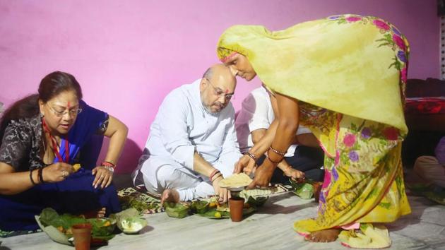 BJP president Amit Shah eats lunch, along with CM Vasundhara Raje , on the concluding day of his three-day visit, in Jaipur on Sunday. (Himanshu Vyas/HT Photo) BJP president Amit Shah eats lunch, along with CM Vasundhara Raje , on the concluding day of his three-day visit, in Jaipur on Sunday. (Himanshu Vyas/HT Photo)