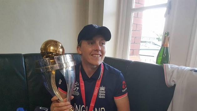 England players pose with the trophy in the dressing room following the victory. (ICC FACEBOOK) England players pose with the trophy in the dressing room following the victory. (ICC FACEBOOK)