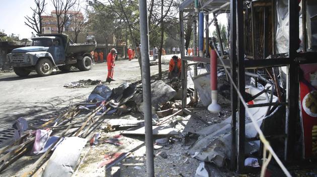 The bomb went off close to the home of Mohammad Mohaqeq, a prominent Hazara politician and deputy to the government’s chief executive. (Massoud Hossaini / AP)