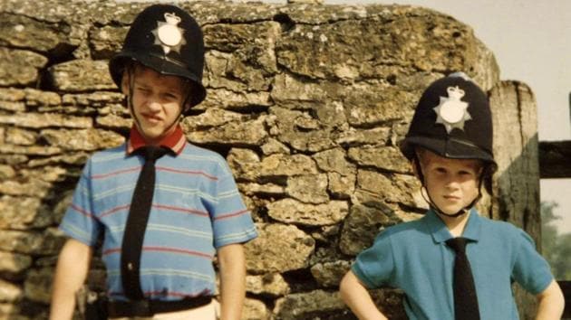 Princes William and Harry dressed as policemen. (Kensington Palace/Handout via REUTERS )