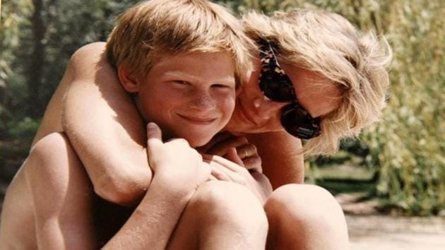Britain's Prince Harry and the late Diana, Princess of Wales are seen in an undated photo released by Kensington Palace. (Kensington Palace/Pool/ Handout via REUTERS)
