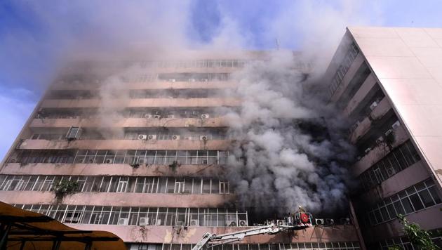 Firefighters douse flames at Delhi’s Lok Nayak Bhawan after a fire broke out at the building’s fourth floor on Monday. (Arun Sharma/HT Photo) Firefighters douse flames at Delhi’s Lok Nayak Bhawan after a fire broke out at the building’s fourth floor on Monday. (Arun Sharma/HT Photo)