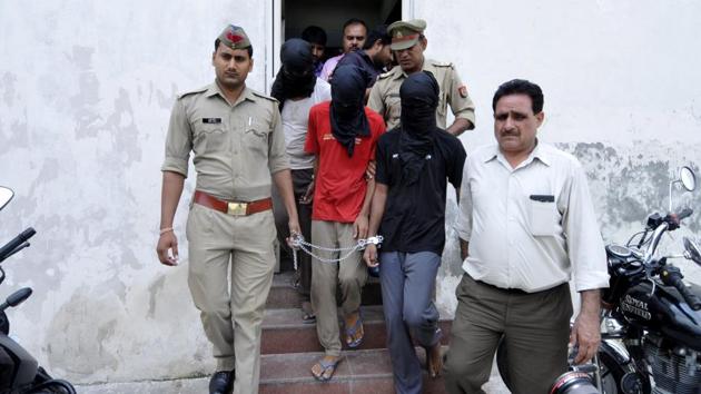 The four men were arrested after an encounter with the police on Sunday. (Sunil Ghosh /HT Photo) The four men were arrested after an encounter with the police on Sunday. (Sunil Ghosh /HT Photo)