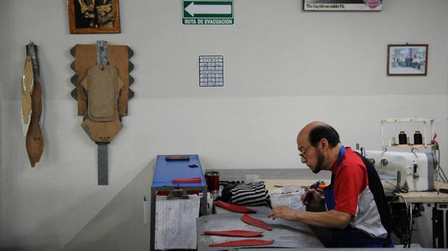 The company was founded by Don Cleto Reyes Casto, who was an aspiring boxer at age 18 but after an amateur fight, Don found the pounding too hard and gave up the sport. Instead, he became obsessed with the gloves he fought in, mending and modifying them until he was certain they were better than any other gloves on the market. (Bernardo Montoya / AFP) The company was founded by Don Cleto Reyes Casto, who was an aspiring boxer at age 18 but after an amateur fight, Don found the pounding too hard and gave up the sport. Instead, he became obsessed with the gloves he fought in, mending and modifying them until he was certain they were better than any other gloves on the market. (Bernardo Montoya / AFP)