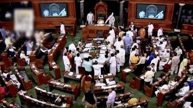 A view of the Lok Sabha as opposition members protest during the ongoing monsoon session of Parliament. (PTI Photo) A view of the Lok Sabha as opposition members protest during the ongoing monsoon session of Parliament. (PTI Photo)