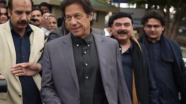 File photo of Pakistan Tehreek-e-Insaf (PTI) chief Imran Khan (centre) leaving the Supreme Court after a hearing on the Panama Papers case in Islamabad on January 6, 2017. (AFP) File photo of Pakistan Tehreek-e-Insaf (PTI) chief Imran Khan (centre) leaving the Supreme Court after a hearing on the Panama Papers case in Islamabad on January 6, 2017. (AFP)