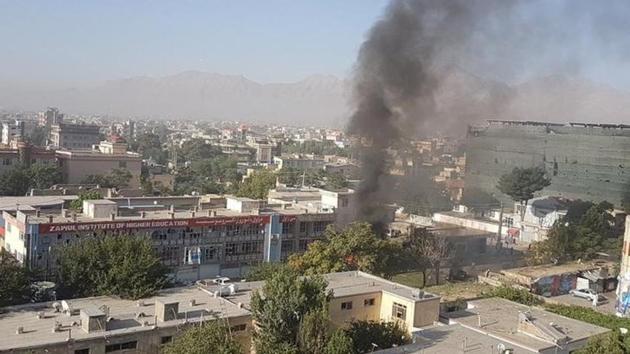 Smokes rising after an explosion at Zawul Institute of Higher Education in Kabul. (Ahmad Shuja / Reuters)