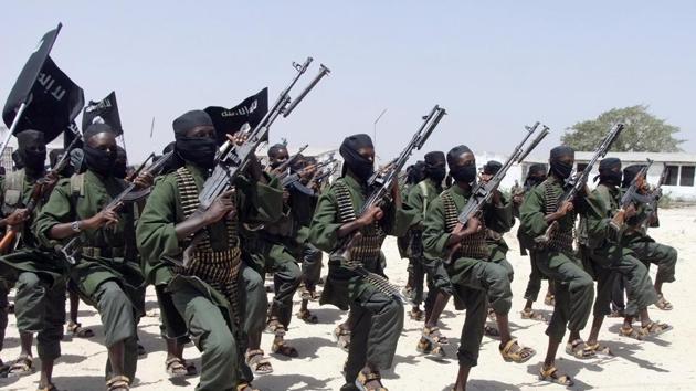 In this Feb. 17, 2011 file photo, hundreds of newly trained al-Shabab fighters perform military exercises in the Lafofe area some 18 km south of Mogadishu, in Somalia.(AP File Photo)