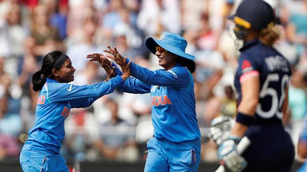 India's Rajeshwari Gayakwad (L) celebrates the wicket of England's Lauren Winfield in the Women’s Cricket World Cup final. (Action Images via Reuters)