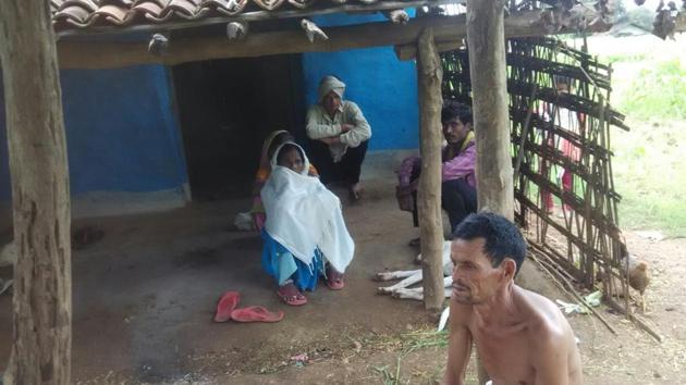 Bale Ivne with his family members outside his house at Palaspani village in Betul district. (Mayank Bhargava/HT Photo) Bale Ivne with his family members outside his house at Palaspani village in Betul district. (Mayank Bhargava/HT Photo)