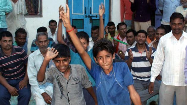 People celebrate after Bihar governor Ram Nath Kovind was announced NDA’s presidential nominee in his village Paraukhan in Kanpur Dehat, Uttar Pradesh. (PTI File Photo) People celebrate after Bihar governor Ram Nath Kovind was announced NDA’s presidential nominee in his village Paraukhan in Kanpur Dehat, Uttar Pradesh. (PTI File Photo)