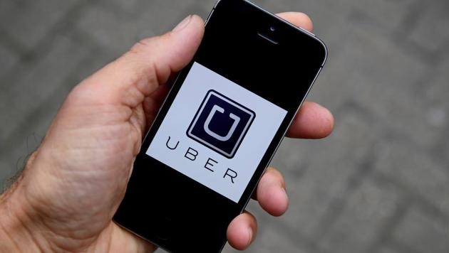 FILE PHOTO: A photo illustration shows the Uber app logo displayed on a mobile telephone, as it is held up for a posed photograph in central London, Britain October 28, 2016. (REUTERS) FILE PHOTO: A photo illustration shows the Uber app logo displayed on a mobile telephone, as it is held up for a posed photograph in central London, Britain October 28, 2016. (REUTERS)