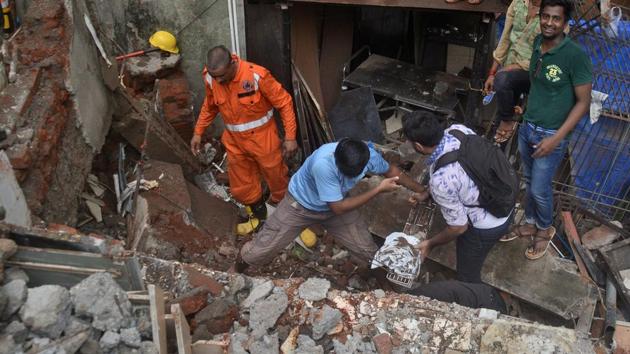 Twelve people were killed and eleven others injured when a four-storey residential building collapsed in suburban Ghatkopar on Tuesday. (Prashant Waydande/HT Photo) Twelve people were killed and eleven others injured when a four-storey residential building collapsed in suburban Ghatkopar on Tuesday. (Prashant Waydande/HT Photo)