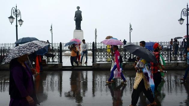 People take a walk as it rains in Shimla, Himachal Pradesh. (Deepak Sansta/HT File Photo) People take a walk as it rains in Shimla, Himachal Pradesh. (Deepak Sansta/HT File Photo)