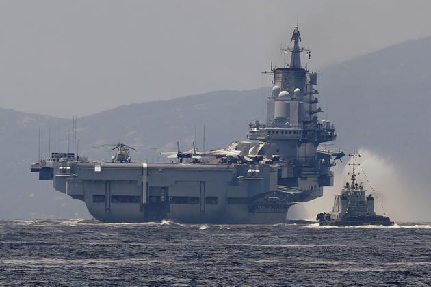 The Liaoning, China's first aircraft carrier, departs from Hong Kong on July 11, 2017.(AP) The Liaoning, China's first aircraft carrier, departs from Hong Kong on July 11, 2017.(AP)
