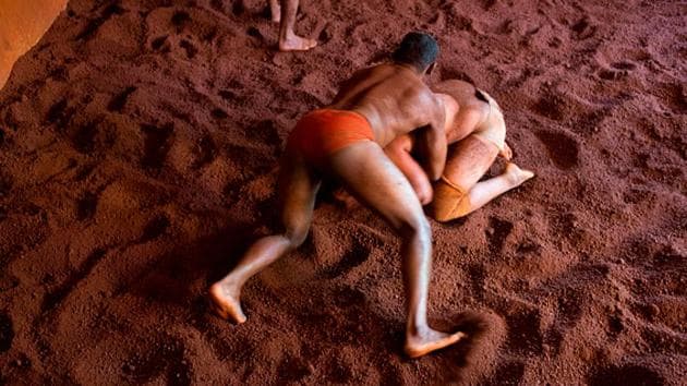 (Picture for representative purpose) India’s first individual Olympic medallist, KD Jadhav, honed his wrestling skills in the mud akhadas of Satara district of Maharashtra, and his family wants to build an academy in his name there to help youngsters pursue the sport.(Getty Images)