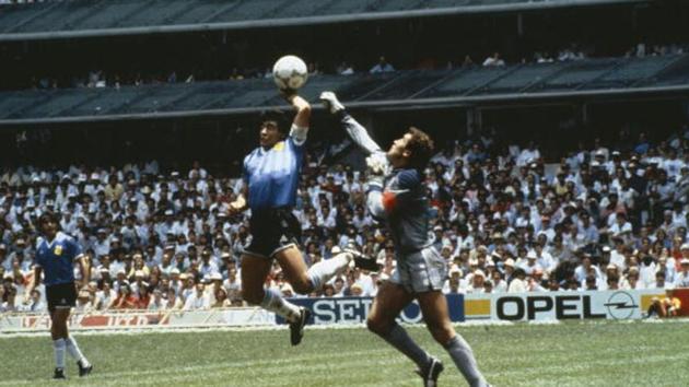 Argentina's Diego Maradona scores first goal with his Hand of God, past England goalkeeper Peter Shilton in 1986 World Cup quarterfinal in Mexico (Getty Images) Argentina's Diego Maradona scores first goal with his Hand of God, past England goalkeeper Peter Shilton in 1986 World Cup quarterfinal in Mexico (Getty Images)