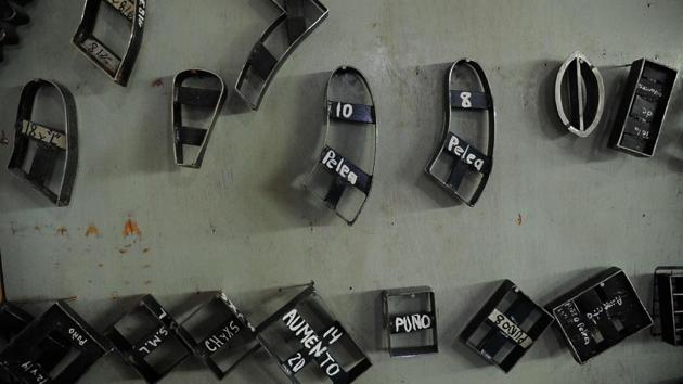 Iron molds used to produce different shapes and sizes of boxing gloves. (Bernardo Montoya / AFP) Iron molds used to produce different shapes and sizes of boxing gloves. (Bernardo Montoya / AFP)