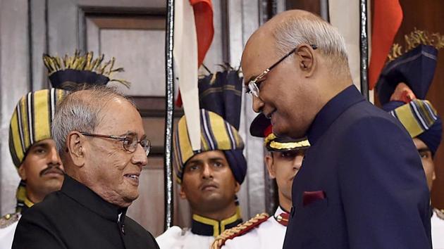 Newly elected President Ram Nath Kovind and his predecessor Pranab Mukherjee exchanging chairs after the former took oath, at a special ceremony in the Central Hall of Parliament in New Delhi on Tuesday. (PTI Photo) Newly elected President Ram Nath Kovind and his predecessor Pranab Mukherjee exchanging chairs after the former took oath, at a special ceremony in the Central Hall of Parliament in New Delhi on Tuesday. (PTI Photo)