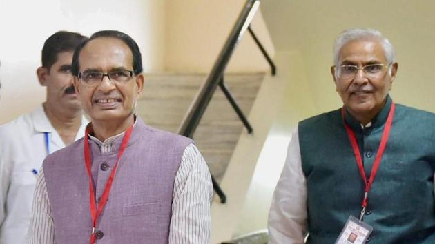 Bhopal: Madhya Pradesh Chief Minister Shivraj Singh Chouhan with Speaker Sita Saran Sharma after casting their votes for Presidential election, at State Assembly in Bhopal on Monday. (PTI) Bhopal: Madhya Pradesh Chief Minister Shivraj Singh Chouhan with Speaker Sita Saran Sharma after casting their votes for Presidential election, at State Assembly in Bhopal on Monday. (PTI)