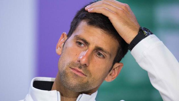 Serbia's Novak Djokovic speaks during a press conference at The All England Tennis Club in Wimbledon.(AFP)