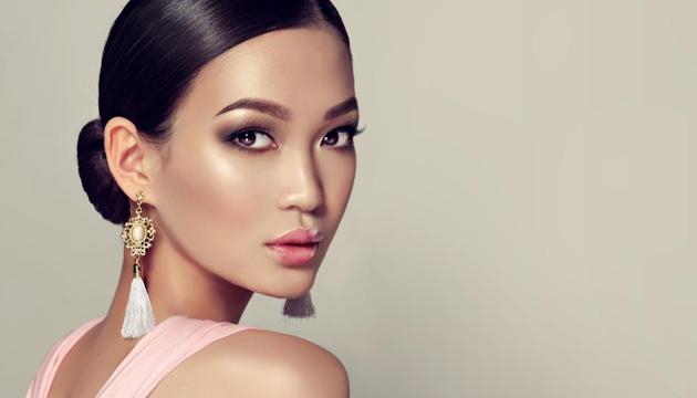 Pop the look with tassel earrings to add much-needed drama. (Shutterstock) Pop the look with tassel earrings to add much-needed drama. (Shutterstock)