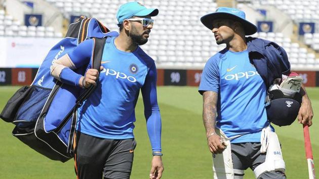 Shikhar Dhawan faced some banter from Yuvraj Singh as he posed with ‘chappals’ during a BCCI photoshoot ahead of the first Test against Sri Lanka in Galle. (AP) Shikhar Dhawan faced some banter from Yuvraj Singh as he posed with ‘chappals’ during a BCCI photoshoot ahead of the first Test against Sri Lanka in Galle. (AP)