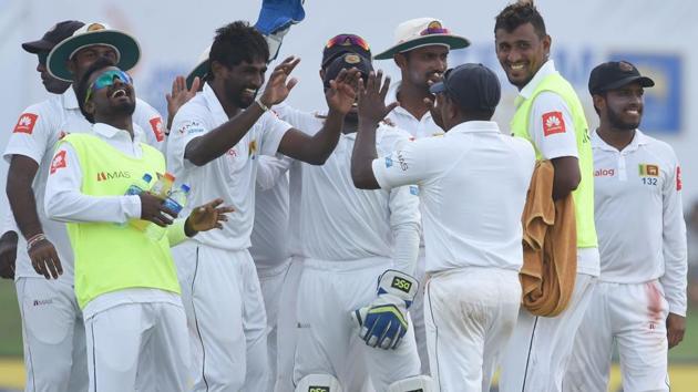 Sri Lankan Nuwan Pradeep (C) was the only bowler to pick up wickets on Wednesday as he scalped three Indians. (AFP) Sri Lankan Nuwan Pradeep (C) was the only bowler to pick up wickets on Wednesday as he scalped three Indians. (AFP)
