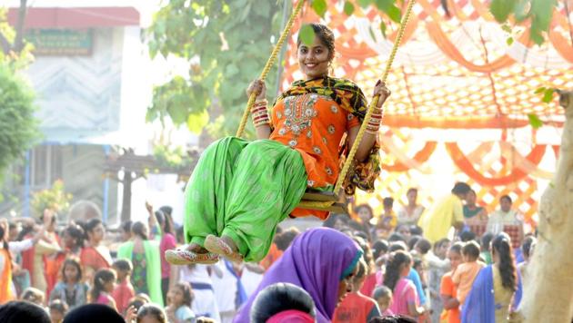 Women in Punjab wear traditional clothes on the day of the festival. Woman ridding a swing during the celebrations of Teej festival at Sanaur on Wednesday. (Bharat Bhushan/HT Photo) Women in Punjab wear traditional clothes on the day of the festival. Woman ridding a swing during the celebrations of Teej festival at Sanaur on Wednesday. (Bharat Bhushan/HT Photo)