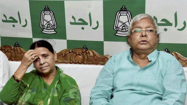 RJD chief Lalu Prasad with wife Rabri Devi at the legislative party meeting, in Patna. (PTI Photo) RJD chief Lalu Prasad with wife Rabri Devi at the legislative party meeting, in Patna. (PTI Photo)