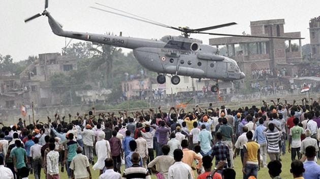An IAF helicopter takes off with Prime Minister Narendra Modi after he addressed an election rally in Bihar in 2015.(PTI FILE)